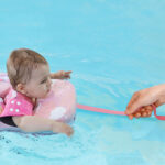 Baby Swimming In The Water Circle - Image 2